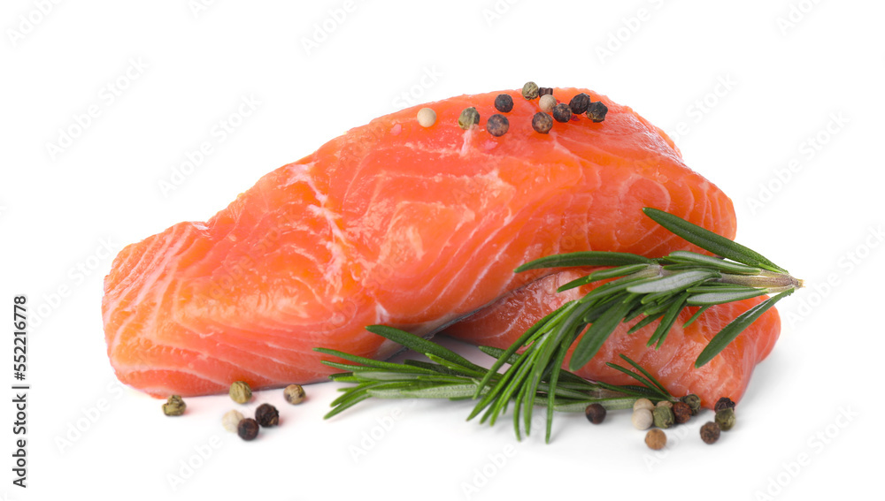 Pieces of fresh raw salmon and spices on white background Pieces of fresh raw salmon and spices on white background