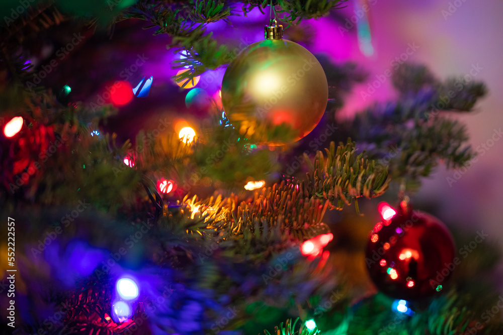 Christmas tree lights with gold and red ornaments Christmas tree lights with gold and red ornaments