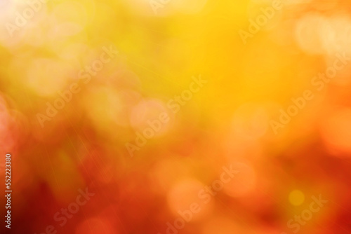 Abstract blurry orange color for background, Blur festival lights outdoor celebration and white bokeh focus texture decorative.