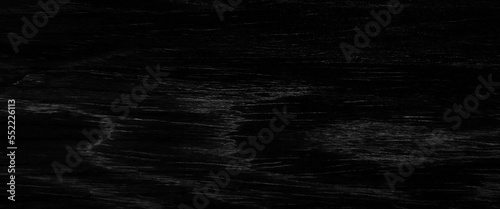 Black wooden texture background blank for design, Black paper house on red wood background, real estate concept, black wood background wooden gray pattern old wall top nature.
