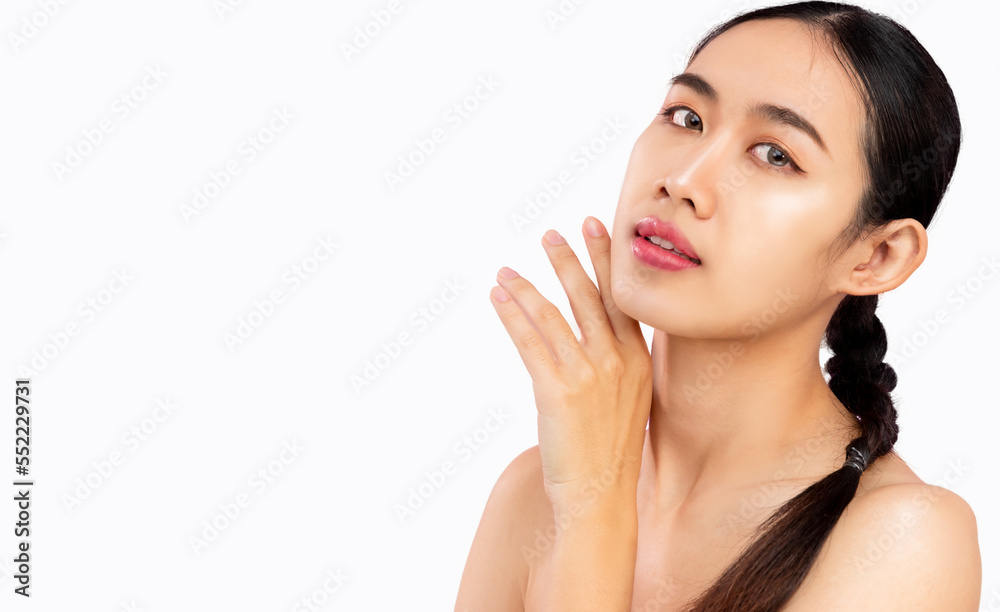 Beautiful young asian woman with clean fresh skin on white background posing hand touching on cheek face care facial treatment, beauty and spa. Asian girl clean face white background. Beautiful young asian woman with clean fresh skin on white background posing hand touching on cheek face care facial treatment, beauty and spa. Asian girl clean face white background.