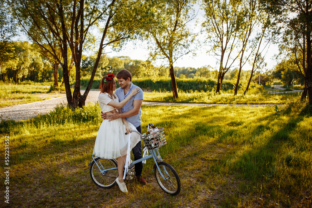 Fototapeta premium Loving couple on vintage bike