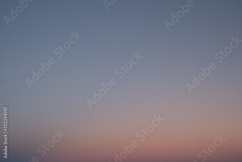 Abstract natural sky background. Space for copy. Morning winter blue-pink sky. Twilight sky background
