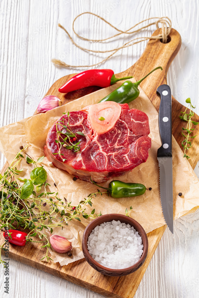 raw osso buco, veal shank steak on cutting board raw osso buco, veal shank steak on cutting board
