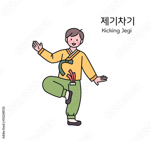 korean traditional play. A boy wearing a hanbok is playing Jegichagi, a traditional game.