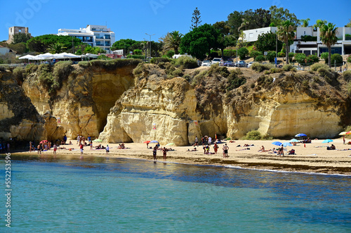Batata beach at Atlantic Ocean seen from the water, popular recreational place, partly covered with algaes, city center of Lagos city, Faro district, Algarve, Portugal, Europe