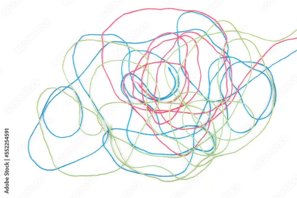 Tangled colorful cotton threads isolated on white background. Abstract thread lines chaos pattern. Tangled colorful cotton threads isolated on white background. Abstract thread lines chaos pattern.