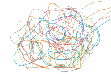 Tangled colorful cotton threads isolated on white background. Abstract thread lines chaos pattern.