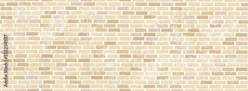 Rectangular wall with a texture of bricks in aged light beige with scuffs and chips. Seamless background.