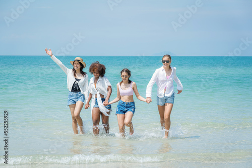 Happy female friends enjoy and fun outdoor activity lifestyle on holiday travel vacation at the sea.