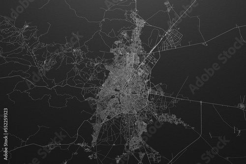 Street map of Konya (Turkey) on black paper with light coming from top