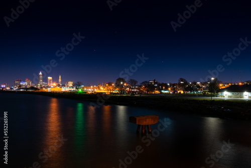 Long exposure of Cleveland skyline with reflecting lights in the lake. © Albert Jackson