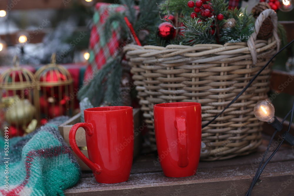 decorated Christmas cart with gifts, duvet, pillow, toys and spruce tree on the background decorated Christmas cart with gifts, duvet, pillow, toys and spruce tree on the background