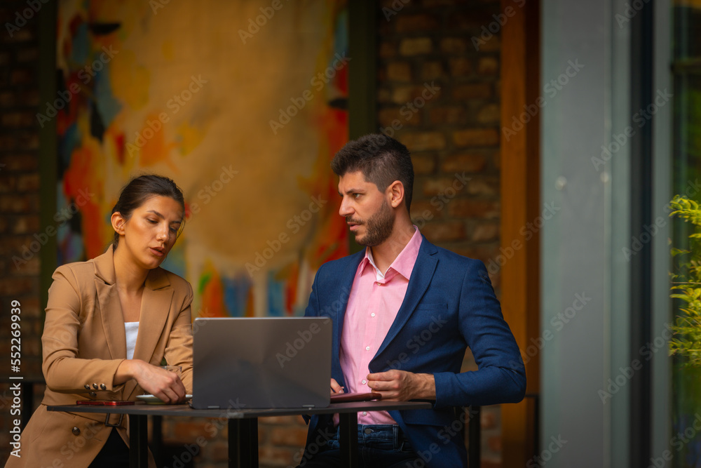 Two attractive business people Two attractive business people