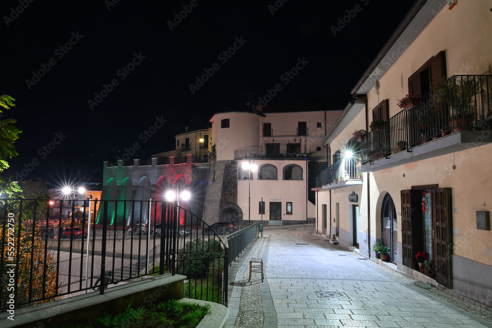 Night view of a street in Ruviano, a small village in the province of Caserta in Italy.	