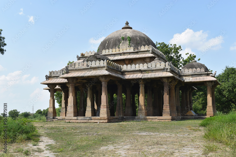 View from left - Cenotaph - Maqbara Octagonal pillars and dome side of Alif Khan Masjid, It was build in 1325 AD by Alif Bhukai in Dholka, Gujrat, India.