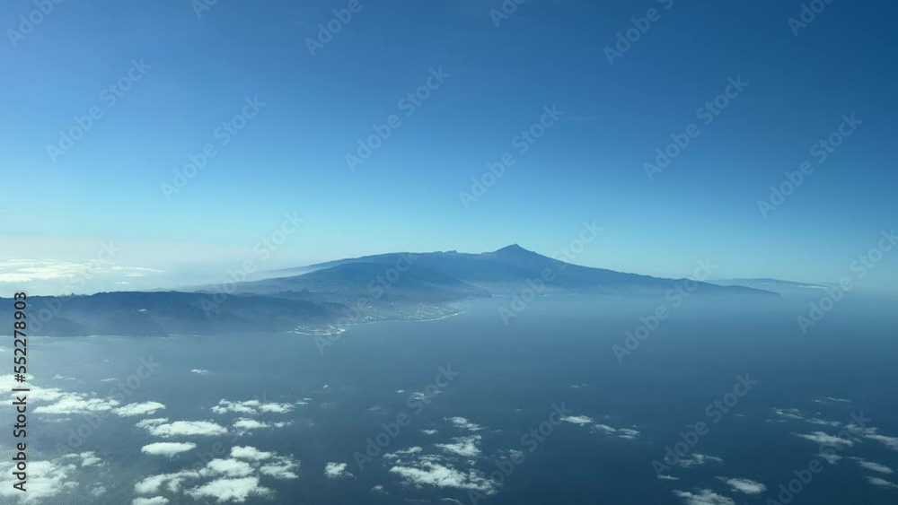 Aerial view from a jet cockpit, pilot point of view, of Tenerife Island, in the Canary Islands, Spain, in a splendid winter moorning. 4k Aerial view from a jet cockpit, pilot point of view, of Tenerife Island, in the Canary Islands, Spain, in a splendid winter moorning. 4k