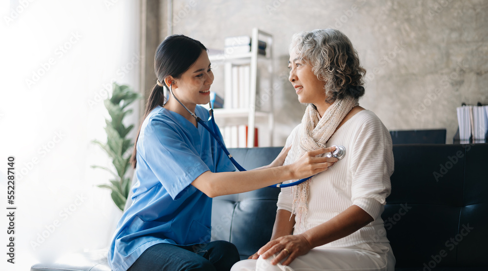 Fototapeta premium Senior woman being examined by a doctor