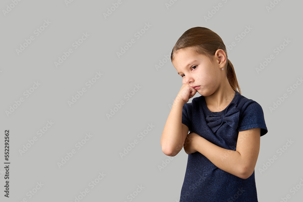 Portrait of a unhappy sad girl, white background Portrait of a unhappy sad girl, white background