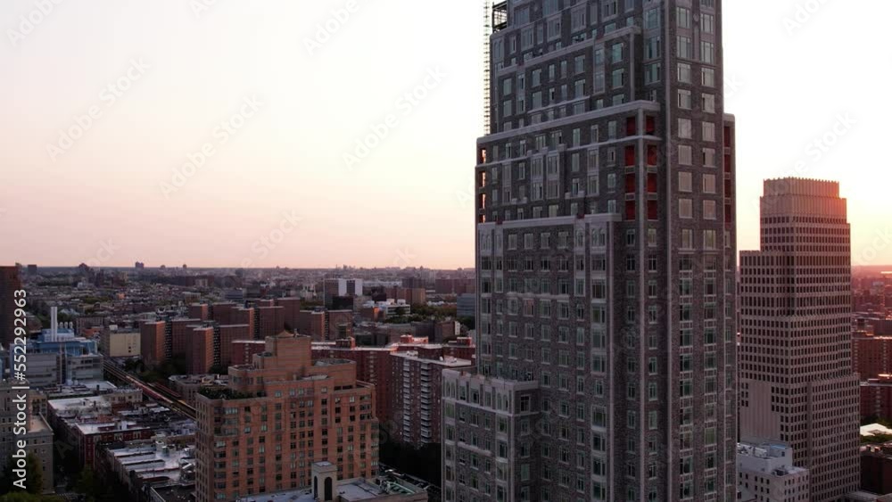 Aerial view of luxury condos overlooking the Riverside Park and the Hudson river, sunset in upper Manhattan, NYC Aerial view of luxury condos overlooking the Riverside Park and the Hudson river, sunset in upper Manhattan, NYC