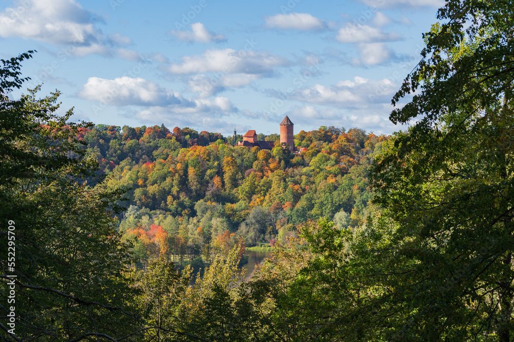 View to Turaida Castle and valley of river Gauja on sunny autumn day