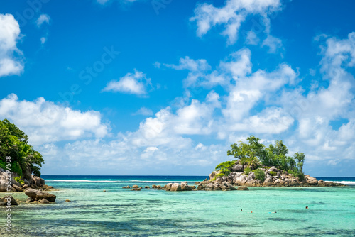 Paradise tropical beach with palm trees and turquoise water. Mahe Island, Seychelles. Anse Forbans Beach © Alexey Oblov