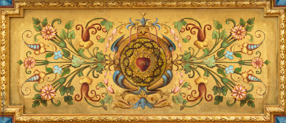 ANNECY, FRANCE - JULY 10, 2022: The heart of Jesus among the flowers painted on the wood in the church Eglise Saint François De Sales by unknown artist.
