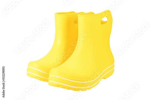Fotografi A pair of yellow rubber boots on a white background.
