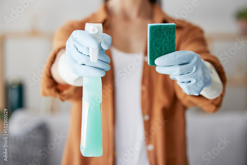 Cleaning service  product or hands with sponge for bacteria  dust or dirty surfaces on furniture in home. Zoom  safety or healthy cleaner with liquid soap chemical in spray bottle for spring cleaning