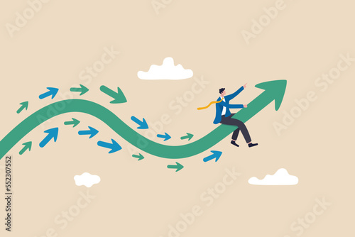 Business trend, initiative thinking to be different and lead to success, trend setter or leadership to follow, leading direction concept, businessman riding trend arrow followed by small followers. photo