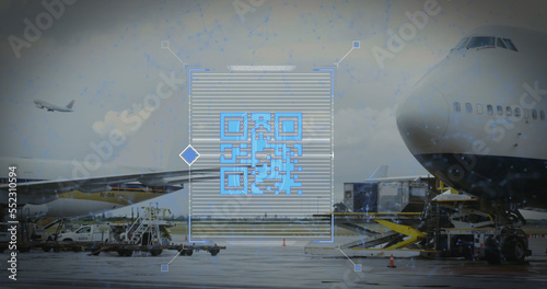 Image of a blue QR code over an airplane taking off