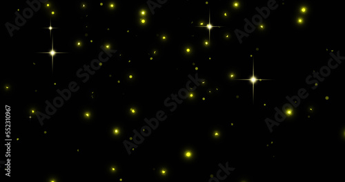 Image of glowing yellow spots falling on black background © vectorfusionart