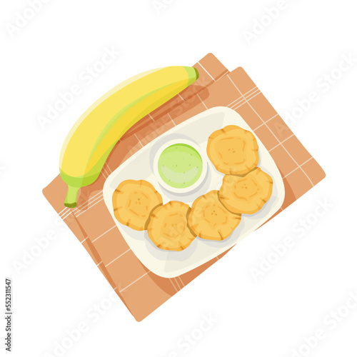 Top view of fried bananas tostones, Latin American cuisine. photo