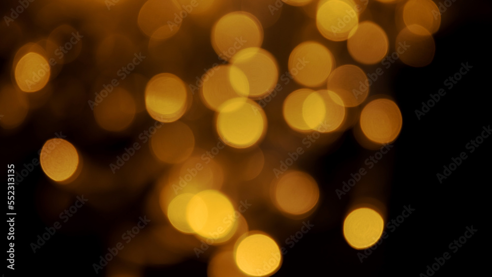 Abstract background of blurred yellow lights for design. Lights bokeh dis focus. Christmas background, copy space Abstract background of blurred yellow lights for design. Lights bokeh dis focus. Christmas background, copy space
