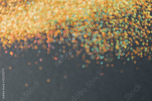 Abstract background of blurred yellow and blue glitter for design. Lights bokeh dis focus. Christmas, festival background, copy space