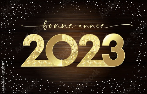 Bonne Annee french text - Happy New Year 2023, golden luxury greeting card. Stylish gold 20 and 23 digits and calligraphy for holiday poster or banner. Vector illustration