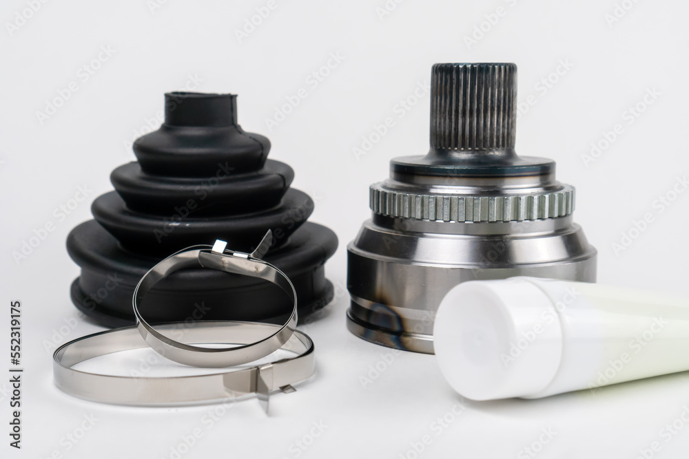 Car CV joint. Drive shaft connection on white background. New constant velocity joints. New automotive CV joints. Quality spare parts for car service or maintenance. Auto parts store. kit with anther Car CV joint. Drive shaft connection on white background. New constant velocity joints. New automotive CV joints. Quality spare parts for car service or maintenance. Auto parts store. kit with anther