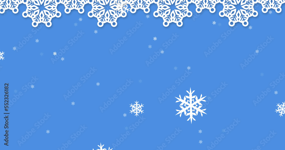Image of snow falling over christmas decorations on blue background Image of snow falling over christmas decorations on blue background