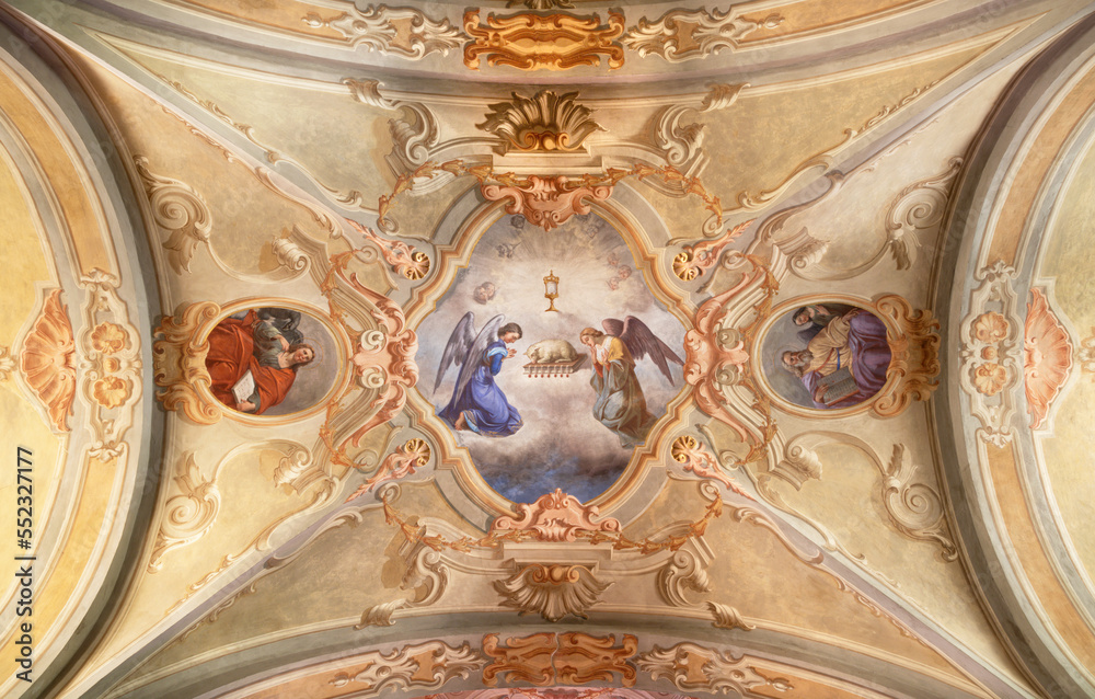 COURMAYEUR, ITALY - JULY 12, 2022: The ceiling fresco of Lamb of God  in church Chiesa di San Pantaleone originaly by Giacomo Gnifetti from18. cent. and restored in1957 by Nino Pirlato.