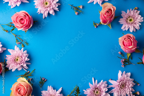Composition of roses on blue background © vectorfusionart