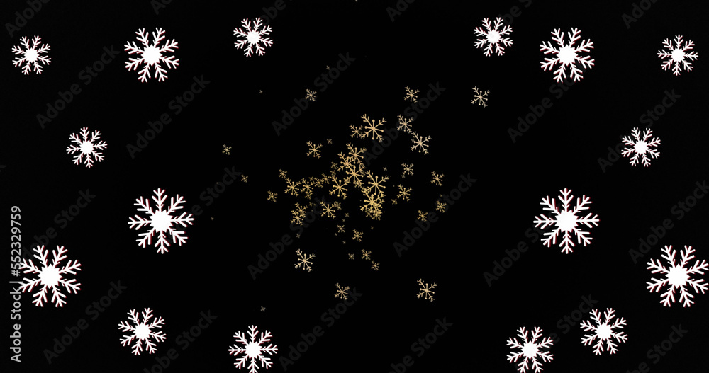 Image of snow falling on black background at christmas