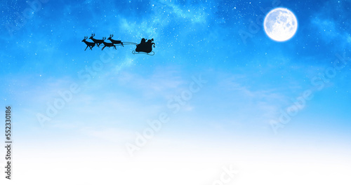 Image of santa claus in sleigh with reindeer over moon and sky © vectorfusionart