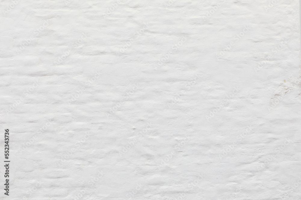 Obraz premium old white brick wall with soft plaster coating