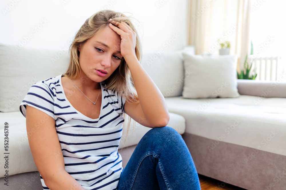 Depression, mental health and woman thinking about a sad memory feeling upset and grief after suffering a loss. Stressed, depressed and disappointed girl worried about a personal problem at home. Depression, mental health and woman thinking about a sad memory feeling upset and grief after suffering a loss. Stressed, depressed and disappointed girl worried about a personal problem at home.