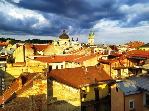 Roof top view in Lviv  Ukraine on the sunset. Roofs of ancient houses from a bird s eye view.