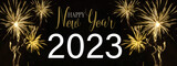 Happy new year 2023, Sylvester, new year's eve background banner panorama long greeting card - Golden firework fireworks pyrotechnics on dark black night sky