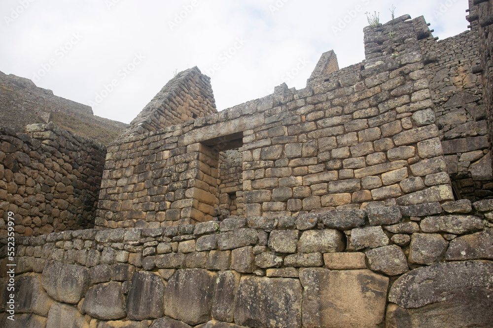 Details of the ancient Inca citadel of the city of Machu Picchu in the Sacred Valley of Peru.