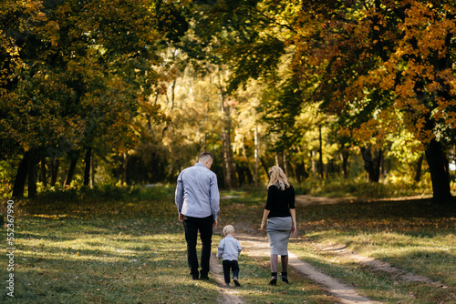 happy family playing and laughing in autumn park © andriyyavor