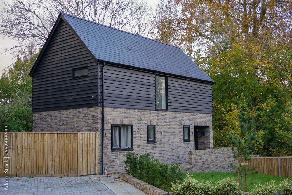small house among trees. Quirky new build home in the UK. small house among trees. Quirky new build home in the UK.