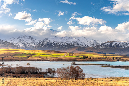 Beautiful view along the Godley Peaks Road to the Adrians Place, Canterbury, New Zealand, South Island. Stunning Southern Alps can be seen along the scenic route. photo